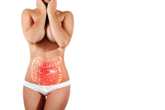 Body of a young beautiful woman with problems in the intestines