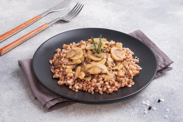 Boiled buckwheat with stewed mushrooms Russian traditional food Healthy diet food