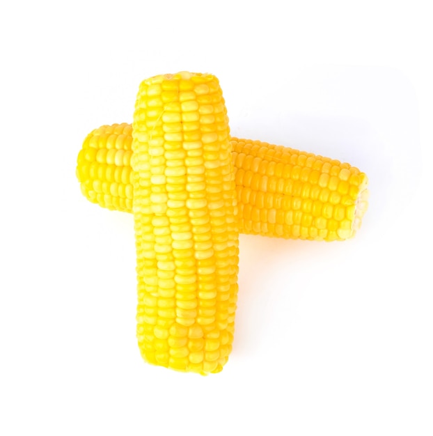 Boiled corns on white background. top view