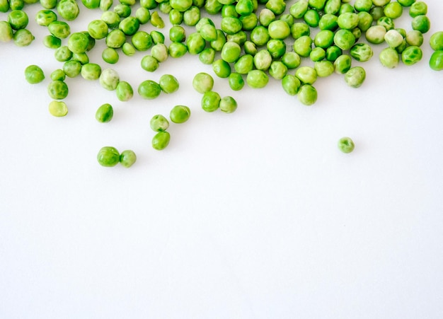 Boiled fresh peas on a light background Boiled peas