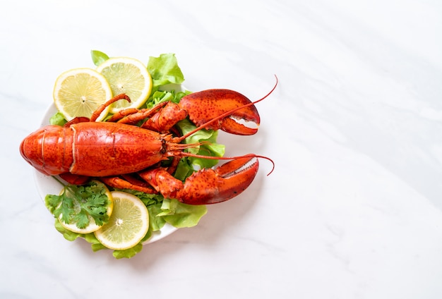 boiled lobster with vegetable and lemon