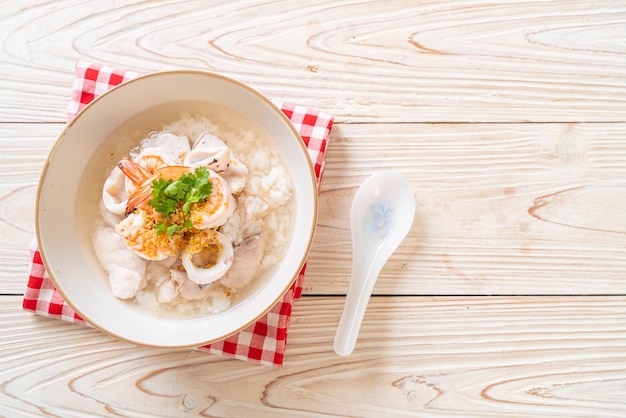 Boiled rice soup with seafood