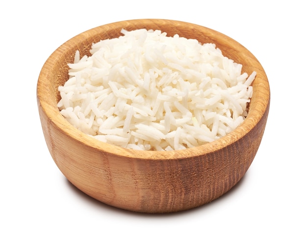 Boiled rice in a wooden bowl isolated