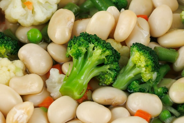 Boiled white beans with vegetables and sauce Cooked white beans