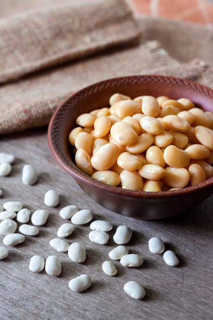 Boiled white kidney beans in a rustic bowl