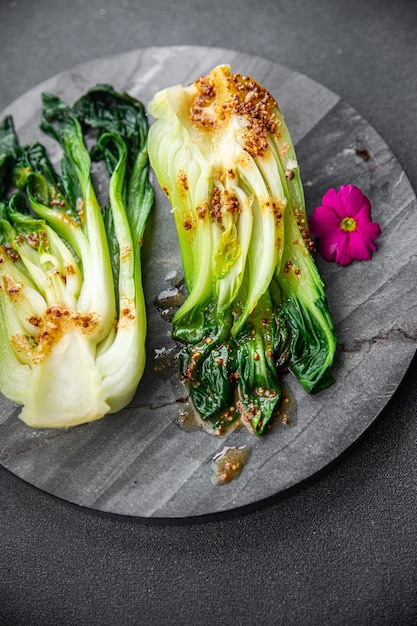 Bok choy or pak choy dish Chinese cabbage vegetable healthy meal food snack on the table