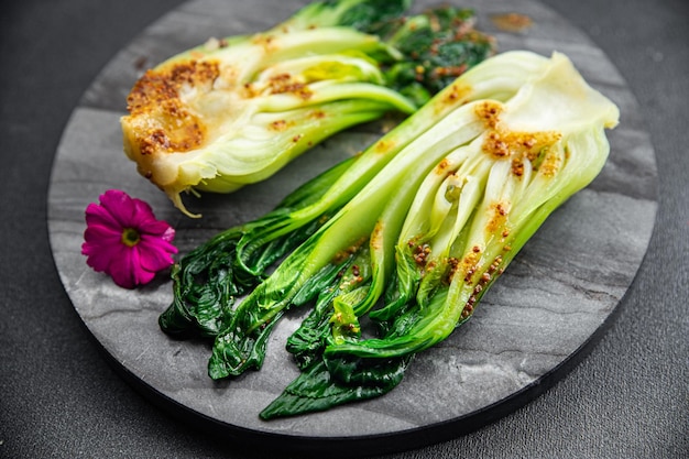 Bok choy or pak choy dish Chinese cabbage vegetable healthy meal food snack on the table