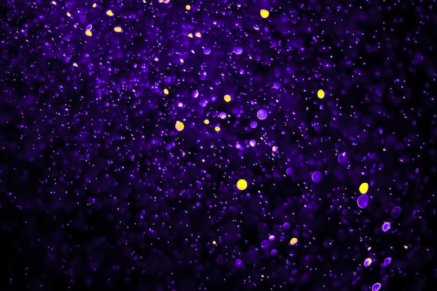 bokeh abstract background with violet purple color and yellow dot bubble