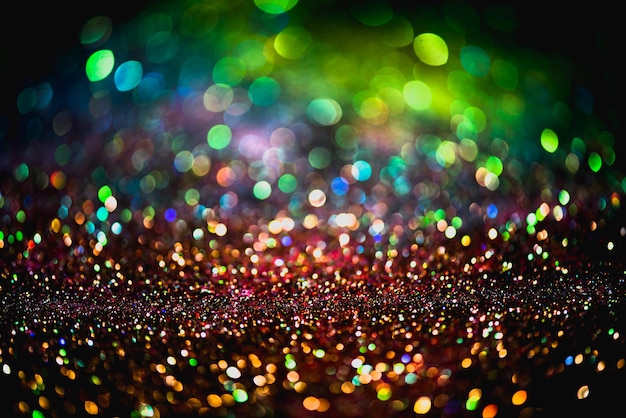 Bokeh effect glitter colorful blurred abstract background for birthday, anniversary, wedding, new year eve or Christmas.