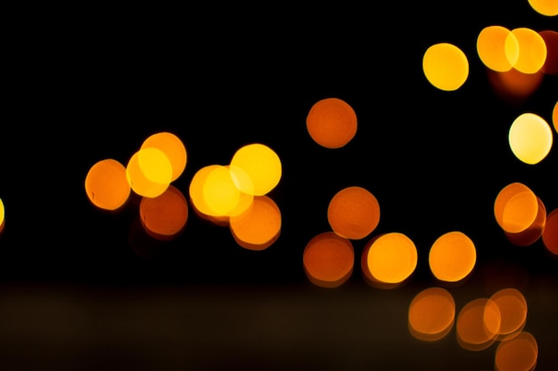 Bokeh effect golden abstract black background