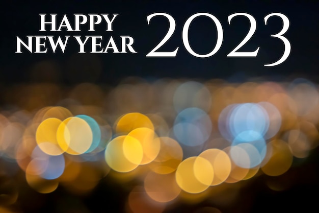 bokeh happy new year 2023 with blurred background with vintage lights