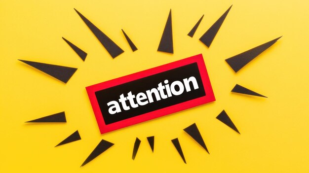 A bold attention sign on a bright yellow backdrop emphasizes urgency and captures viewers focus effectively