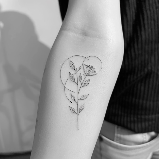 Photo bold linework tattoo with a minimalist aesthetic