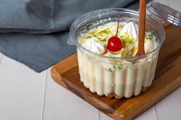 bolo de pote, traditional brazilian sweet dessert, inside a plastic container.