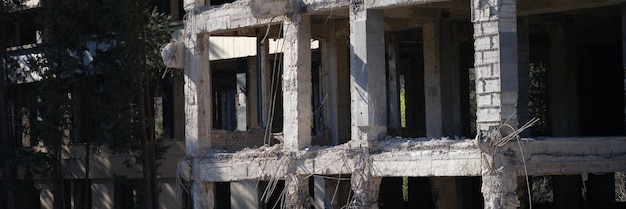 Bombedout multistorey building in ukraine during war with russia building reconstruction