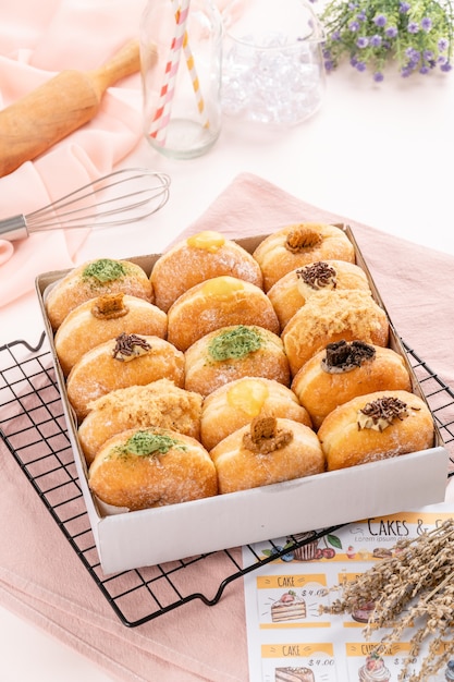 A bombolone or bomboloni is an Italian filled doughnut and is eaten as a snack food and dessert