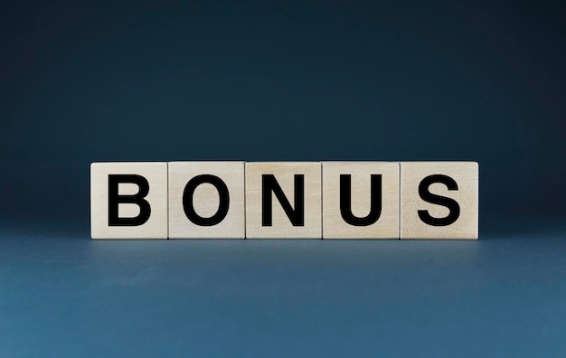 Bonus Cubes form the word Bonus Extensive bonus concept like gift and money