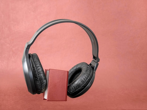 Book and headphones Listen to audiobooks The concept education and learning, library, students