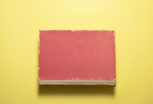 Book on the yellow background