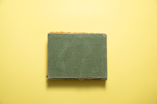 Book on the yellow background