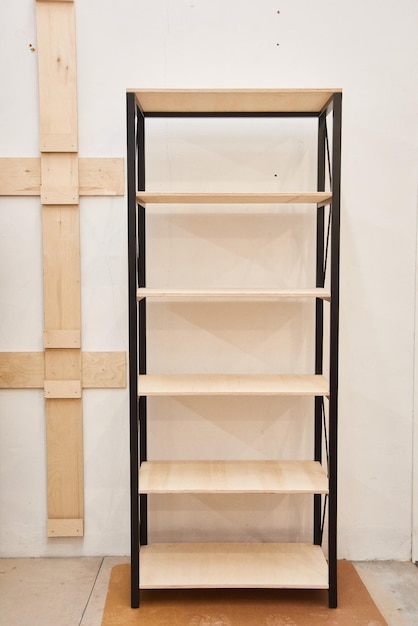 bookcase with 6 six shelves in production in wooden furniture manufactory wooden structure