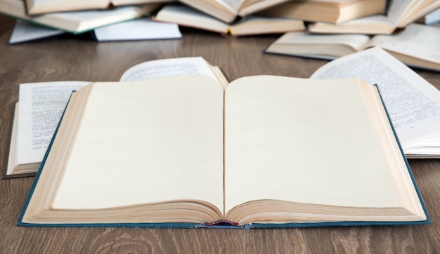 Books on a wooden background