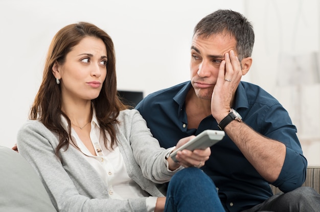 Bored Couple Watching Tv