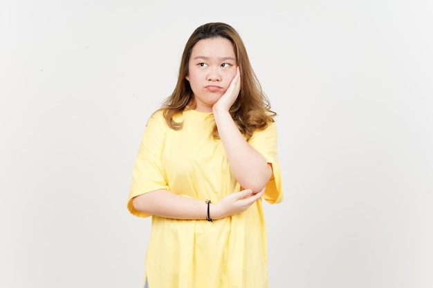 Boring gesture of Beautiful Asian Woman wearing yellow TShirt Isolated On White Background