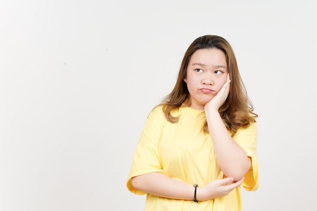 Boring gesture of Beautiful Asian Woman wearing yellow TShirt Isolated On White Background