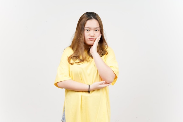 Boring gesture of Beautiful Asian Woman wearing yellow TShirt Isolated On White Background