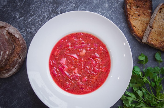 Borsch in a white plate, Menu, Russian cuisine recipe, Dark background