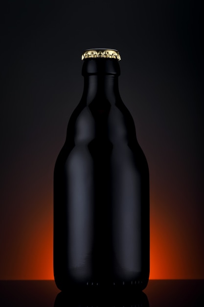 Photo bottle of beer on a gradient black background