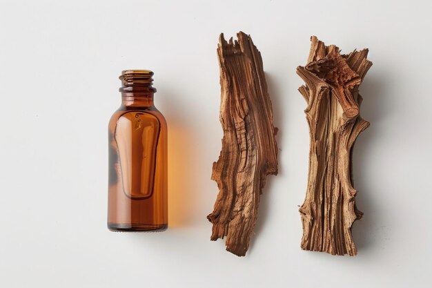 bottle of cedarwood oil with cedarwood on plain white background from Generative AI ar 32 Job ID 021