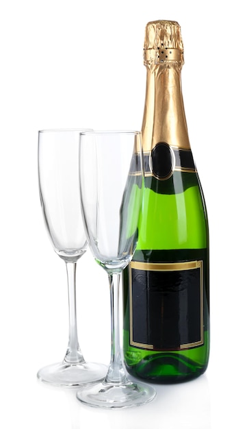 Bottle of champagne and empty glasses isolated on white