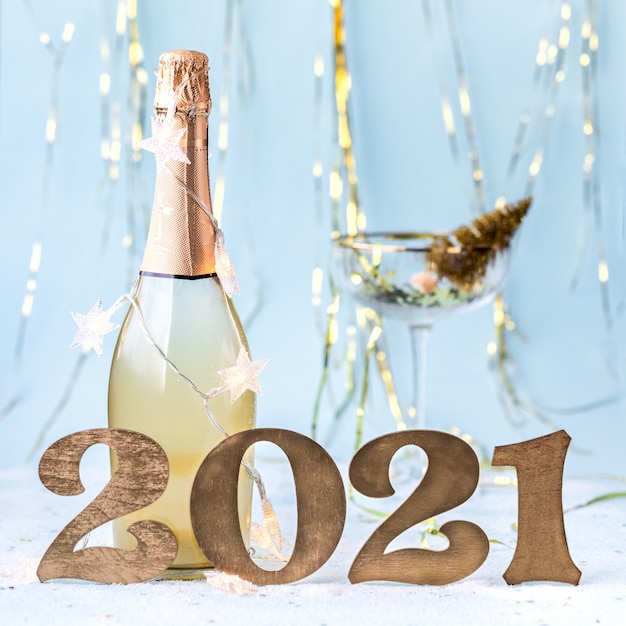 Bottle of champagne with New Year decorations