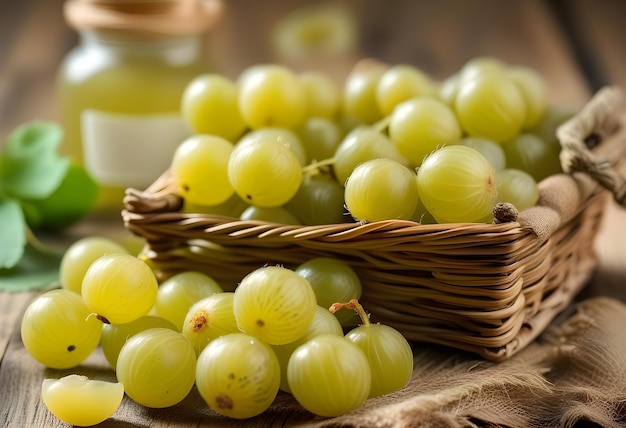 A bottle of Indian gooseberry essence with a basket of raw amla in the background