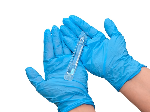 Bottle of injections in the arm, doctor's hands in medical gloves.