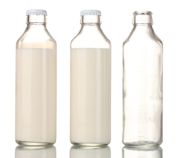 Bottle of milk and an empty bottle isolated on white