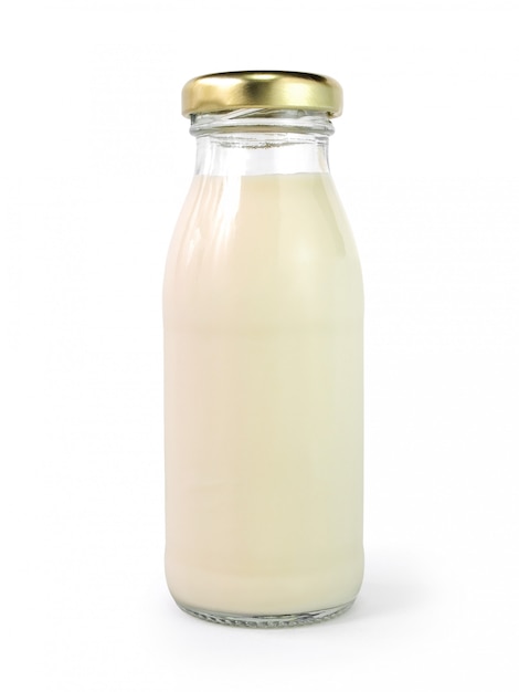 A bottle of milk with golden cap isolated on white background