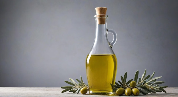 a bottle of olive oil next to a bunch of olives