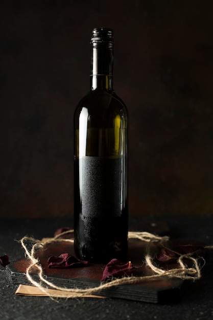 A bottle red wine on on the brown background