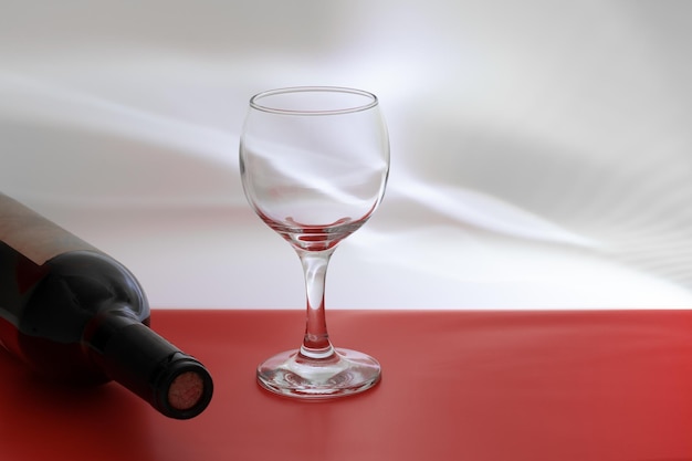 Bottle of red wine and glasses on a table