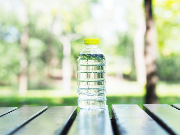 Bottle of water on wooden table