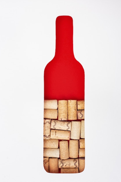 Bottle of wine is filled with wine corks