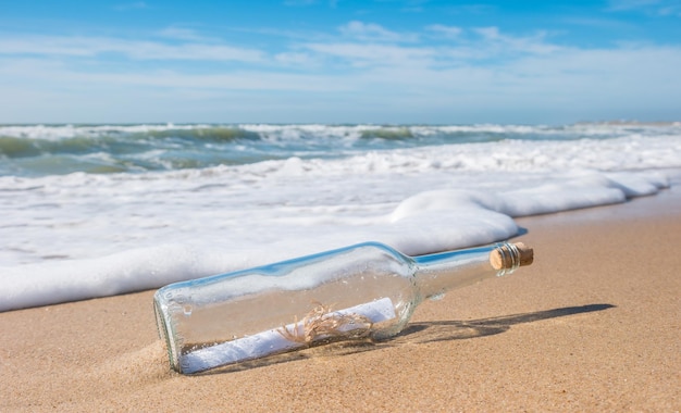 Bottle with a message at the beach