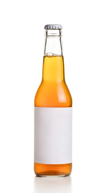 Bottle with yellow drink and empty label on white