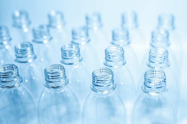 Bottling plant  Plastic bottles Abstract background of plastic bottles Selective focus