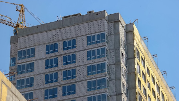 Bottom and top of a new higrise skyscraper building building with installed windows