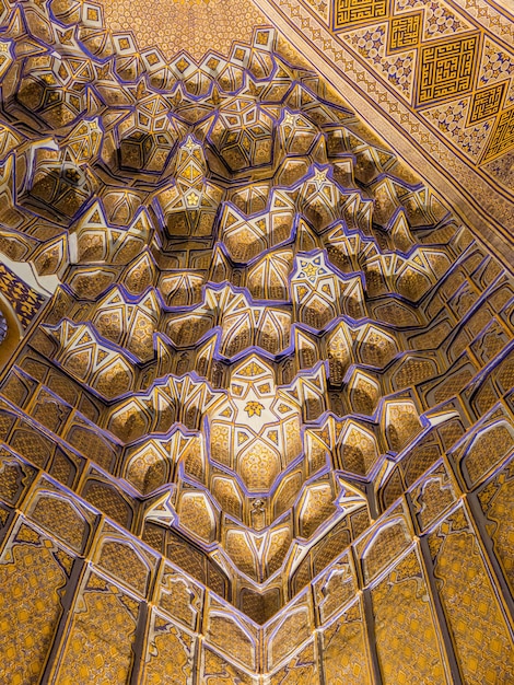 Bottom up view of ancient traditional Uzbek Islam religious building interior Samarkand Uzbekistan