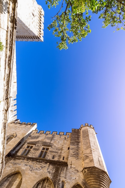 Bottom up view of the Palace of the Popes walls in Avignon city.